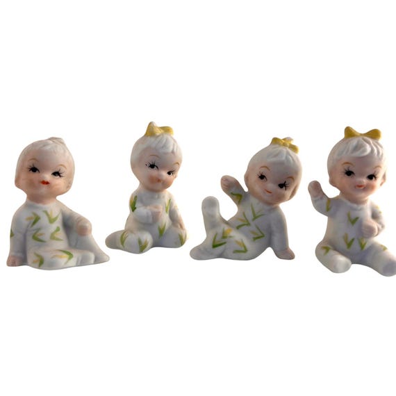 Vintage 1950s Bisque Baby Figurines Set of 4 | Yellow Bows Green Leaf Pajamas