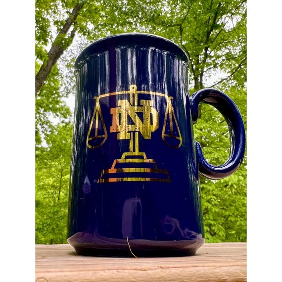 Notre Dame Law School Mug Navy  and Gold | Scales of Justice