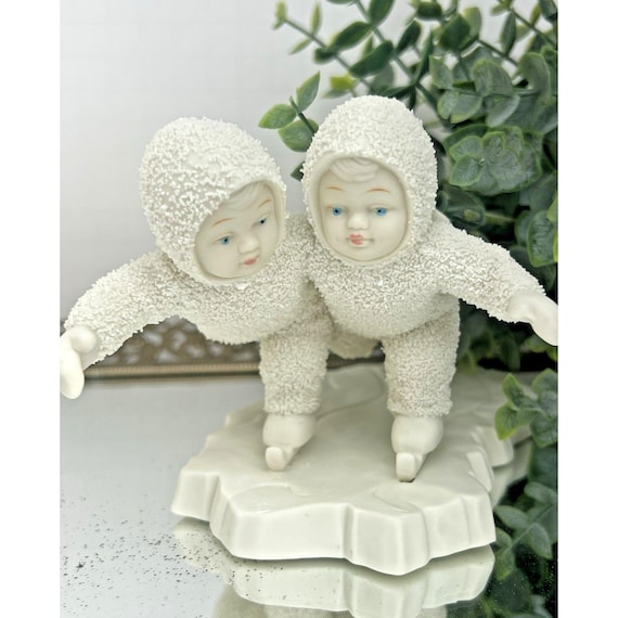 Department 56 Snowbabies Ice Skating Figurine: Bisque Porcelain Winter Tales