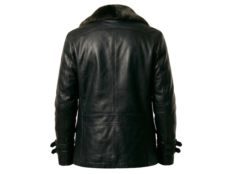 May include: Black leather jacket with a dark fur collar. The jacket has a double-breasted design, two side pockets, and adjustable straps on the sleeves. The back view shows a tailored fit and a classic, timeless style.
