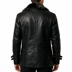 May include: Black leather jacket with a faux fur collar. The jacket has a double-breasted design, two front pockets, and buckle details on the sleeves. A classic outerwear piece.