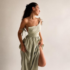 Chokladbrun linneklänning Ärmlös sommarmaxi boho solklänning fickor rustik minimalistisk semesteroutfit stugfärgad samlad midja Olive