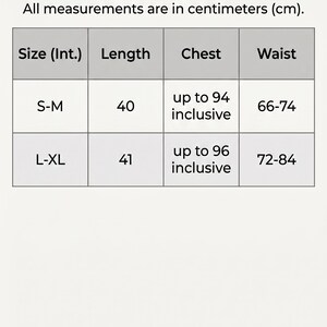 May include: Size chart with measurements in centimeters. The chart includes sizes S-M and L-XL, with corresponding length, chest, and waist measurements. The text "SIZE CHART" is at the top.