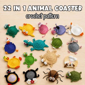 May include: A collection of 22 in 1 animal coaster crochet patterns featuring various colourful, circular, and shaped yarn designs including frogs, turtles, ducks, and spiders with button eyes and textured details on a light wood surface.