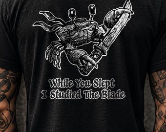 While You Slept I Studied The Blade Back Print Shirt, Crab Warrior Meme Tee, Funny Gothic Streetwear, Anime Nerd Humor, Original Hand Drawn