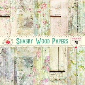 Op de afbeelding: Een digitaal papierpakket met 12 verschillende ontwerpen met verweerde houten planken met bloemmotieven in roze, groene en witte tinten. De tekst "SHABBY WOOD PAPERS" wordt weergegeven op een turquoise banner.