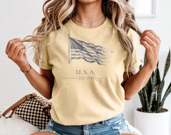 アメリカ国旗 設立1776年Tシャツ、ミニマルな愛国的なグラフィックTシャツ