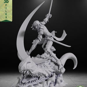 May include: A grey 3D printed figurine of a warrior in armor standing on a large dragon head. The warrior holds a sword aloft, with a large crescent moon shape behind them. The text KEA 3D FILES appears in the top left and bottom right corners.