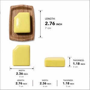 May include: A rectangular yellow block with one rounded corner, shown on a wooden tray and from side angles. Dimensions are 2.76 inches in length, 2.36 inches in width, and 1.18 inches in thickness, as indicated by the text and measurement lines.