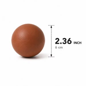 May include: A smooth, solid brown sphere with a matte finish. A vertical measurement graphic indicates the object has a diameter of 2.36 inches. The sphere features a subtle horizontal seam line running around its center, consistent with a molded construction.
