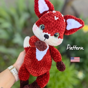 May include: A white ceramic mug with a black handle and the text "But First, Coffee" in a black, bold font. The mug is on a white surface. The mug is approximately 4 inches tall.