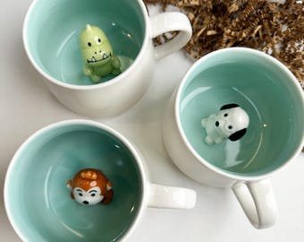 Taza de cerámica con forma de animal