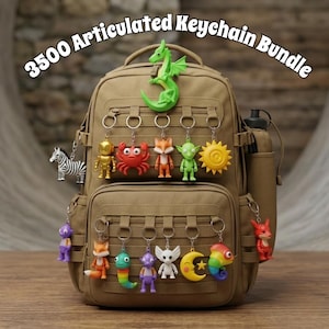 May include: A tan backpack with multiple keychains attached, including a zebra, robot, crab, fox, goblin, sun, and more. The keychains are colorful and feature various animal and fantasy designs. Text on the image reads "3500 Articulated Keychain Bundle."