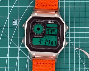 Casio AE1200 Watch with Green Filters and Orange Band Custom Mods