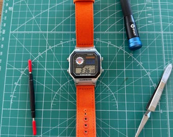 Casio AE1200 Watch with Blue And Orange Filters With Knicks Logo Decal and Orange Band Custom Mods