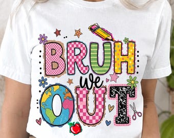 May include: White t-shirt with a colorful graphic that reads "BRUH WE OUT." The design includes a globe, pencil, flowers, stars, and a red apple. The letters are in various patterns and colors, creating a playful and eye-catching design.