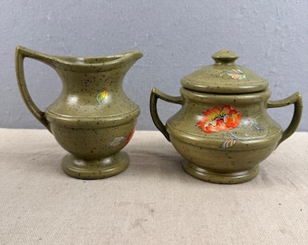 Vintage jaren 1970 gespikkeld steengoed suiker- en creamerset oranje klaproos bloemen