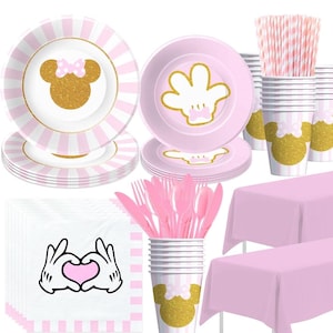 May include: A white ceramic mug with a black handle and the text "But First, Coffee" in a black, bold font. The mug is on a white surface.