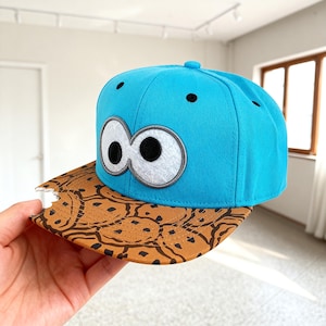 Krümelmonster Hut - Augenklappe Snapback Cap für Kinder & Erwachsene Geburtstagsgeschenke für