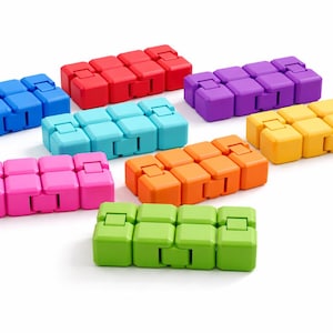 May include: A collection of colorful fidget toys in various shades, including blue, red, purple, yellow, orange, pink, green, and teal. Each toy is composed of connected, cube-shaped blocks. The toys are arranged on a white background.