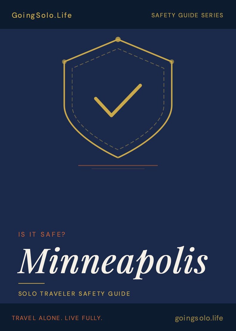 May include: A dark blue digital safety guide cover titled GoingSolo.Life Safety Guide Series. It features a gold shield icon with a checkmark, the text IS IT SAFE? Minneapolis, SOLO TRAVELER SAFETY GUIDE, TRAVEL ALONE. LIVE FULLY. and goingsolo.life.