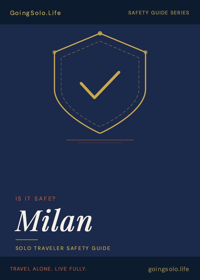 May include: A navy blue graphic with the text "Going Solo.Life" and "Safety Guide Series". The image features a shield with a checkmark, the word "Milan", and the text "Solo Traveler Safety Guide". The phrase "Travel Alone. Live Fully." is also included.