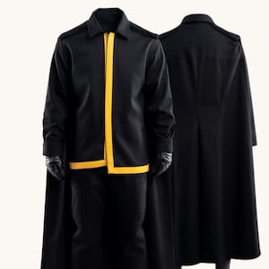 May include: A set of three ceramic mugs with a speckled, matte finish in cream, light grey, and dark grey. Each mug has a minimalist design and a rounded handle.