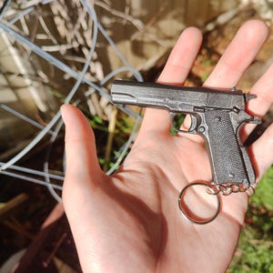 Porte-clés miniature noir métallique Colt 1911, modèle réaliste à l'échelle 1:16, cadeau pour les amateurs de tactique, accessoire ABS imprimé SLA