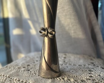 Silver plated metal twisted bud vase with bow detail