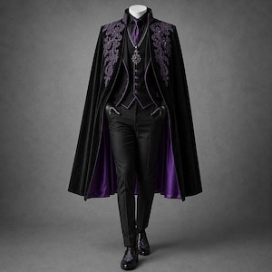 May include: A black velvet cape featuring purple floral embroidery, worn over a black vest with purple trim, a black shirt, a purple tie, and black trousers. The ensemble includes a dark pendant and black shoes with purple embroidered details.