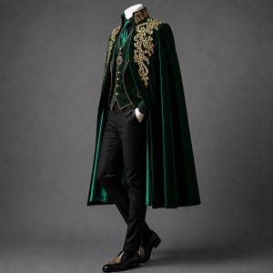 May include: A dark green velvet cape featuring intricate gold embroidery along the collar and front panels, worn over a matching green vest, a green shirt with a tie, black trousers, and black dress shoes with gold accents on the toes.