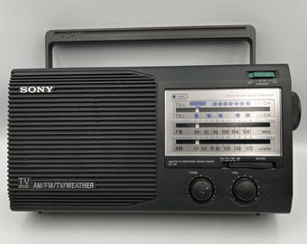 Radio portátil Sony ICF-36 AM/FM con banda meteorológica y TV, modelo antiguo. Funciona con pilas de CA. Probada.