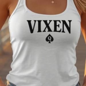 May include: White vest top featuring the word "VIXEN" in bold black lettering and a black spade queen symbol. The top is made of a soft material.