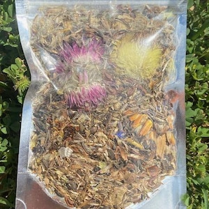 May include: A set of three ceramic mugs with a speckled, matte finish. Each mug features a different color: light blue, cream, and gray. The mugs have a simple, modern design with a rounded shape and a comfortable handle.