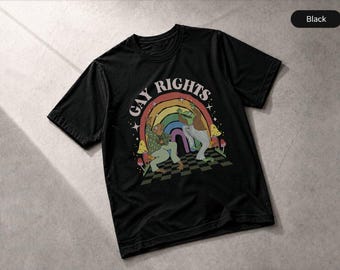 Camiseta "Say Gay Frog Toad" (Di Gay) con el lema "Say Gay Rights" (Di Gay), "LGBT Pride Ally" (Aliada del Orgullo LGBT) y "Lesbiana".