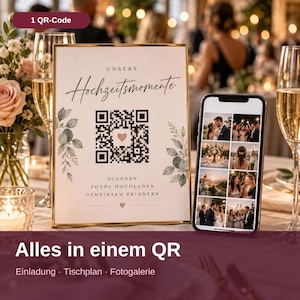 Könnte beinhalten: Ein rechteckiges Schild mit Goldrahmen, das den Text "UNSERE Hochzeitsmomente" und einen zentralen QR-Code mit einem kleinen Herzsymbol zeigt. Darunter steht "SCANNEN FOTOS HOCHLADEN GEMEINSAM ERINNERN" mit einem kleinen Herz am unteren Rand.