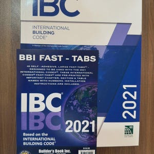 May include: A set of three ceramic mugs with a speckled, matte finish. The mugs are in shades of cream, light gray, and dark gray. Each mug has a simple, minimalist design, perfect for coffee or tea.