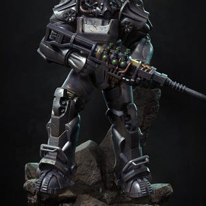 May include: A detailed statue of a figure in weathered, metallic power armor, holding a futuristic rifle. The armor is dark gray with intricate mechanical details, standing on a rocky base. The rifle has green and yellow accents.