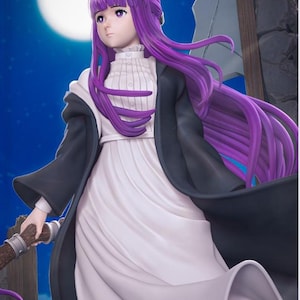 May include: A detailed figurine of a character with long, flowing purple hair and a white dress, accented by a black cloak. The figure is holding a staff, set against a night sky with a full moon.