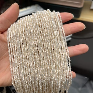 Naturliga sötvattenspärlsträngar (1,8-2 mm) för smyckestillverkning
