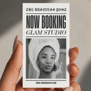May include: A black and white business card with the text "THE BUSINESS POST" at the top. The card says "NOW BOOKING GLAM STUDIO" and features a woman with a towel on her head. The website address is www.yourwebsite.com.