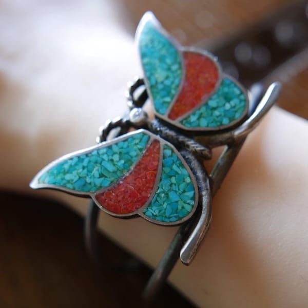 Adorable vintage Navajo sterling silver cuff bracelet with butterfly motif and turquoise and coral shard mosaic inlay in wings