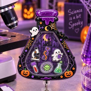 May include: A purple and black enamel badge reel shaped like a potion bottle, featuring a spooky laboratory scene with a microscope, DNA strand, ghost, test tube, virus, and flask. The frame is decorated with orange pumpkins and stars.