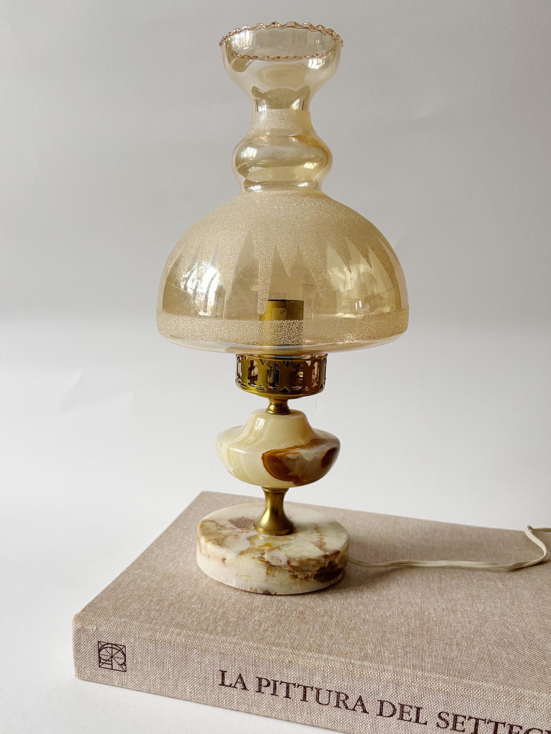 Paire de lampes, bronze à patine brune et doré, figurant des putti Paire de lampes, bronze à patine brune et doré, figurant des putti