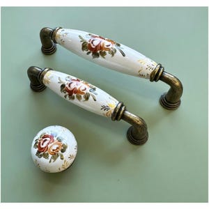 Tirador decorativo de porcelana blanca y oro antiguo para cajones, 96-128 mm / Un solo orificio. Ideal para armarios, cómodas, cocinas, baños, vestidores y salas de estar.