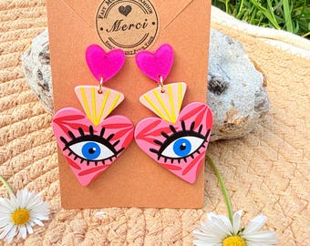 pendientes con dije de ojo de la suerte