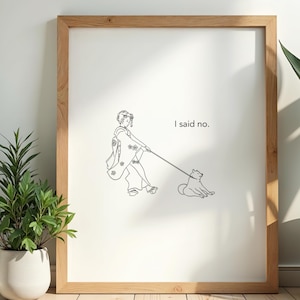 May include: A framed art print featuring a line drawing of a woman in traditional Japanese attire walking a dog. The dog is sitting down, and the text "I said no." is displayed on the print.
