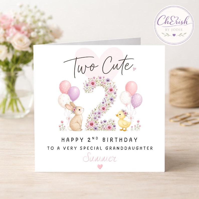 May include: A square birthday greeting card featuring the text Two Cute and Happy 2nd Birthday to a very special granddaughter Summer. The design includes a large floral number two, a brown bunny, a yellow duckling, and pastel balloons.