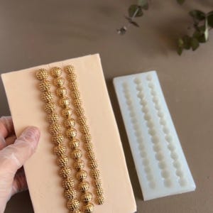 Oriental-style button decorations are for enhancing cakes, cookies, and cupcakes.