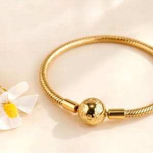 Gold pandora bracelet - Etsy 日本